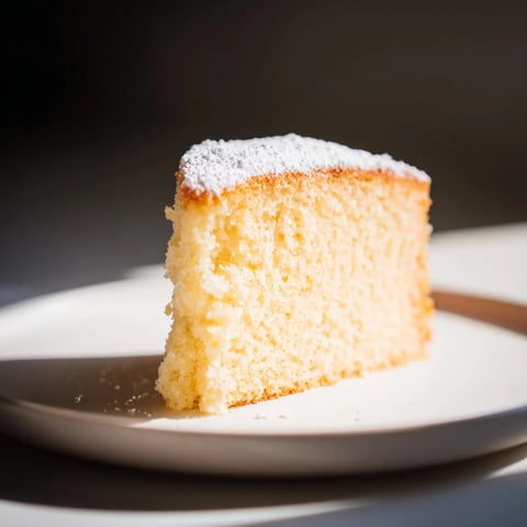 Fluffy, golden Simple 3-Ingredient Vanilla Sponge Cake, ready to be frosted and enjoyed as dessert.
