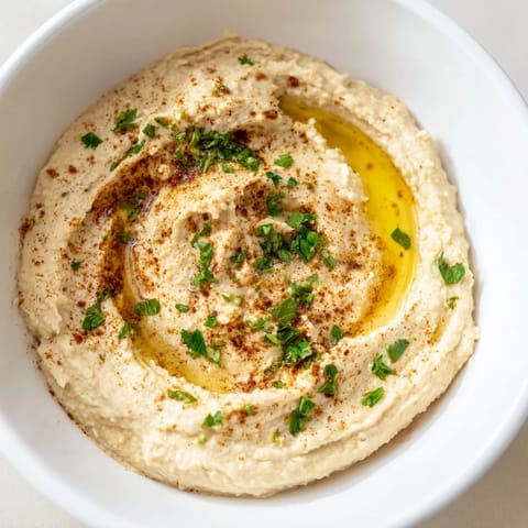 Creamy 5-Minute Homemade Hummus, a smooth, delicious chickpea dip, perfect for pita bread.